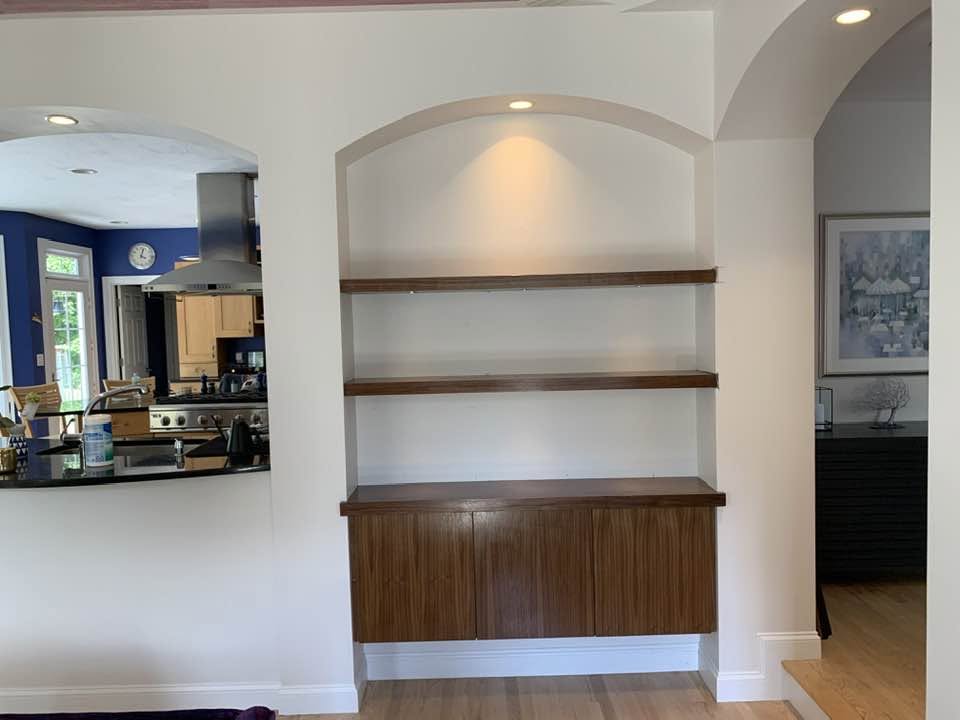 Custom Built-In — Shelving & cabinet unit with arched niche